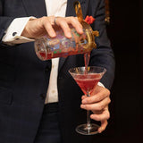 Cocktail Party Shaker Set - glass and strainer - pouring into glass