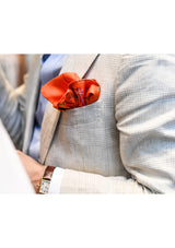 Cocktail Party Pocket Square styled and tucked into a pocket