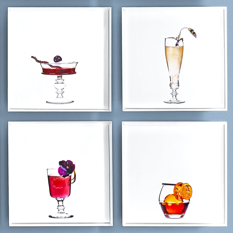 A group of 4 cocktail portraits together